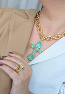 Colar Ester menta com crucifixo de pedras menta e boreal banhado no dourado