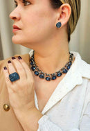 Brinco Elizia montana de gota com strass montana banhado no grafite