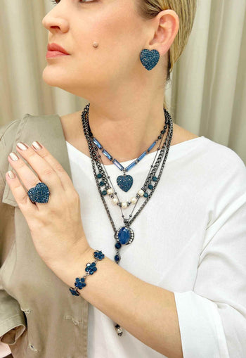 Brinco Mabele montana grafite de pedras azuis