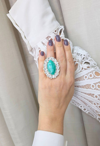 Maxi Anel Angela com strass cristal e pedra verde agua banhado no dourado