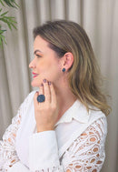 Anel Dandara redondo com strass azul banhado no ouro velho