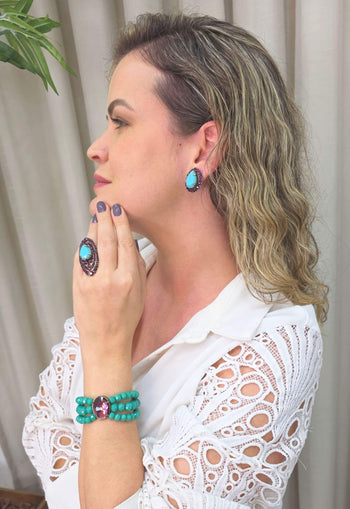 Pulseira Florentino de cristais azuis e pedras ametista banhado no ouro velho