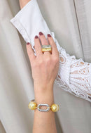 Pulseira Singular clássica de perolas com detalhes em dourado e elos prata