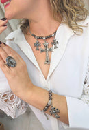 Pulseira Santina com crucifixo de pedras black diamond e hematite