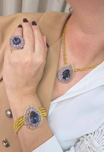 Pulseira Charline com pingente de gota de pedras ametista, azul e black diamond banhado no dourado