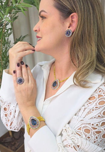 Pulseira Charline com pingente de gota de pedras ametista, azul e black diamond banhado no dourado
