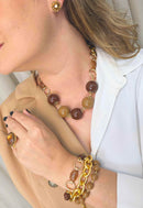 Pulseira Acervo: Mix de Elos com Bolas e Pedras em Tons Marrom no Dourado | Peça Exclusiva