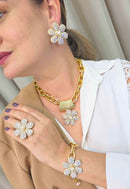 Pulseira Samara com pingente de flor boreal e elos dourados