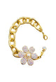 Pulseira Samara com pingente de flor boreal e elos dourados