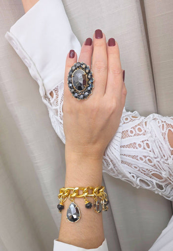 Pulseira Noemia de pedras hematite banhada no dourado
