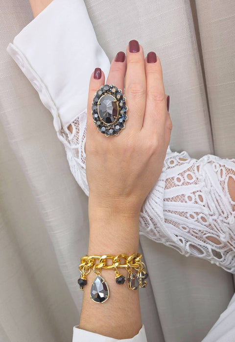 Pulseira Noemia de pedras hematite banhada no dourado