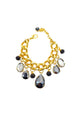 Pulseira Noemia de pedras hematite banhada no dourado