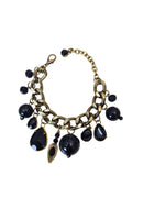 Pulseira Janira de pingentes pretos com elo no ouro velho