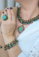 Pulseira Arminda luxo com perolas e cristais cobreados e verde banhado no ouro velho