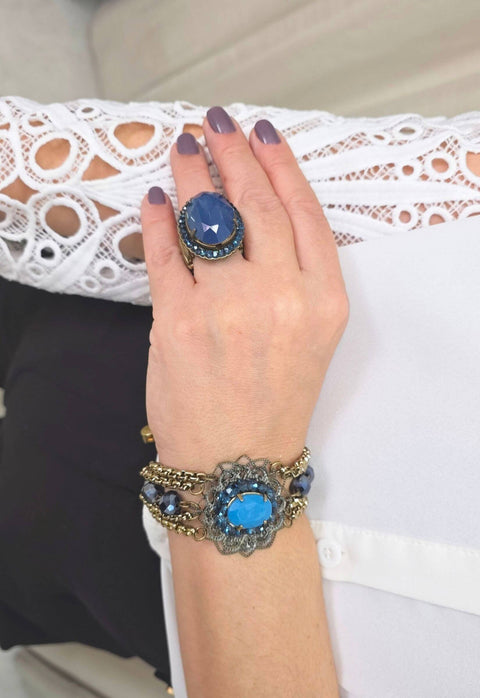 Pulseira Melodia de pedras azul com pingente ouro velho